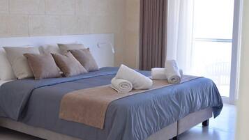 Frette Italian sheets, premium bedding, down duvets, desk