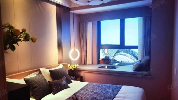 A modern hotel room with a large bed, a window with a view, and a circular light fixture. - 3-bedroom, 2 bedroom, 1 livingroom, 1 kitchen with washer-dryer, WiFi, AC  (Shang Hai Shi)