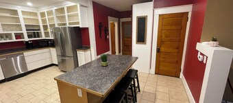 Spacious 4-bedroom home with atv/snowmobile trail across the street. Come UP!