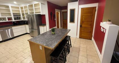 Spacious 4-bedroom home with atv/snowmobile trail across the street. Come UP!