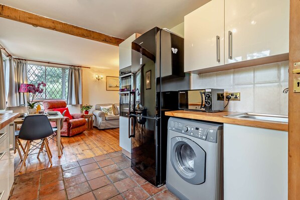 Fridge, microwave, oven, cookware/dishes/utensils