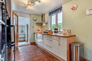 Fridge, microwave, oven, cookware/dishes/utensils