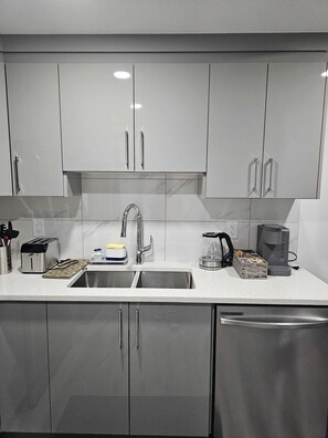 Fridge, microwave, oven, stovetop - Contemporary Two Bedroom Basement Suite. (Edmonton)