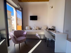 Family Room, Multiple Beds, Balcony | Minibar, in-room safe, desk, blackout drapes