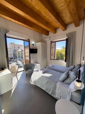 Classic Twin Room, 2 Twin Beds, Balcony | Minibar, in-room safe, desk, blackout drapes