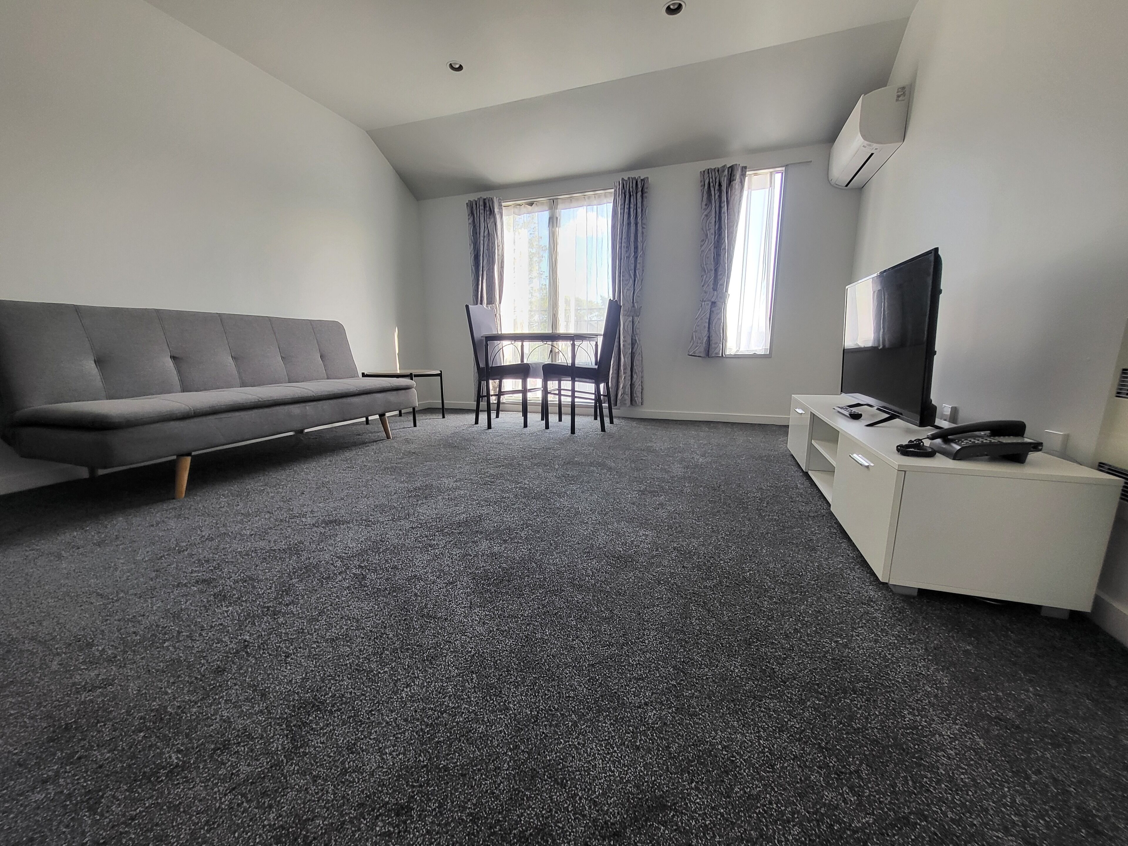 Junior Suite, Courtyard View | Living area | 32-inch LED TV with digital channels