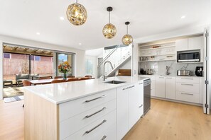 Fridge, microwave, dishwasher, coffee/tea maker