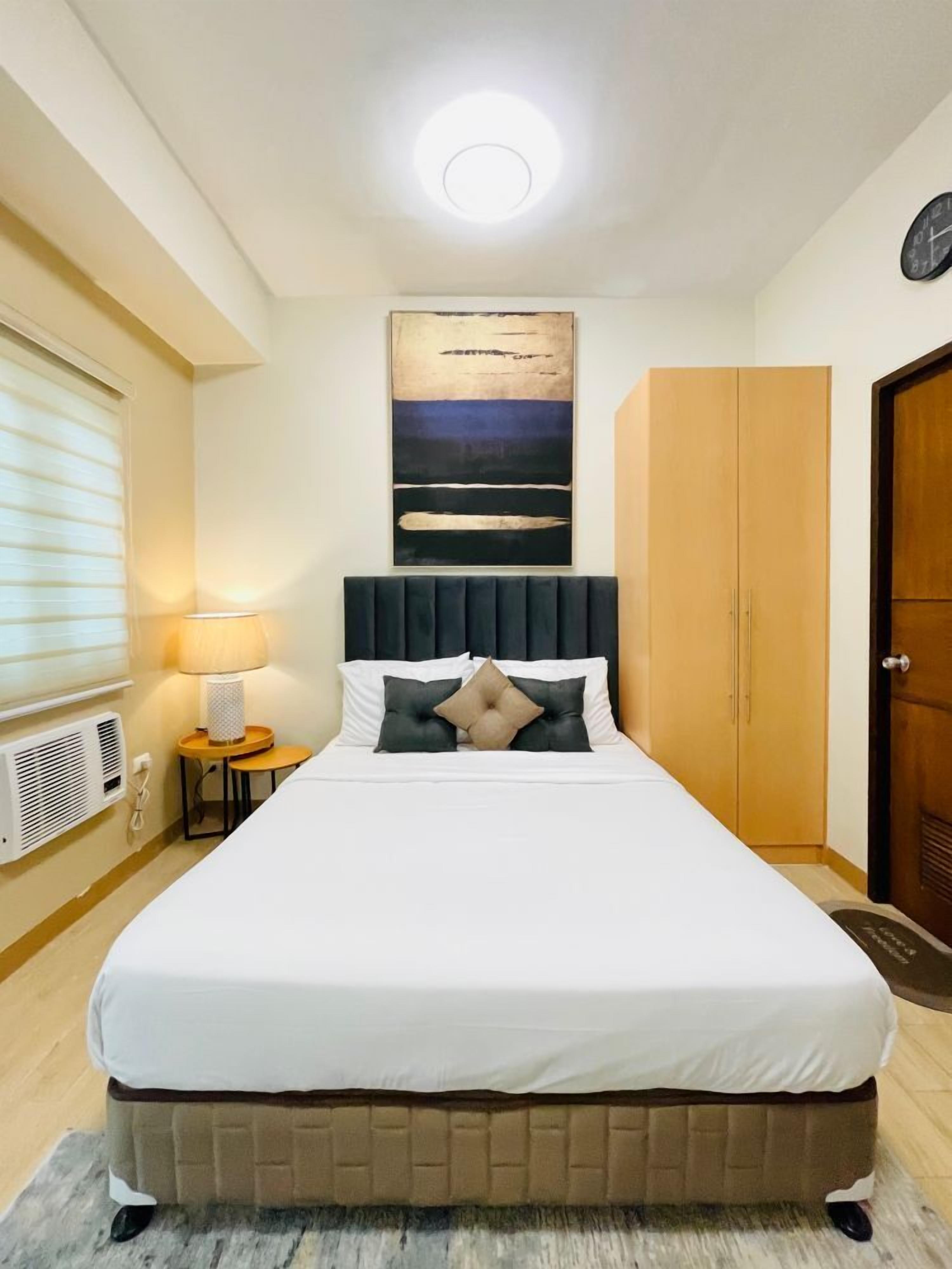 Fer et planche à repasser, draps fournis