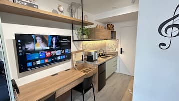 Fridge, microwave, stovetop, coffee/tea maker