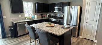 New, central spacious stadium townhome in West Seneca. Fully furnished, WiFi, AC