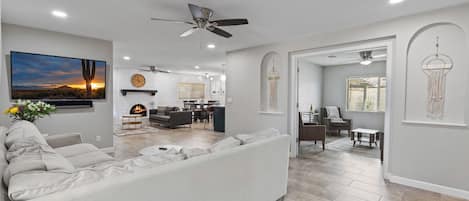 Smart TV, fireplace, books, stereo