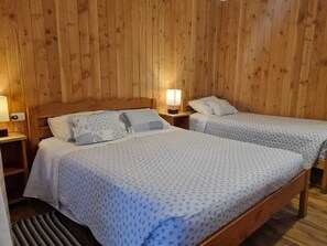 Triple Room, Garden View | Minibar, laptop workspace, blackout curtains, free WiFi - Antu Apart Hotel Villarrica (Villarrica)