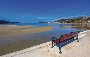 Sit and take in the serene views from this scenic bench overlooking the calm waters.