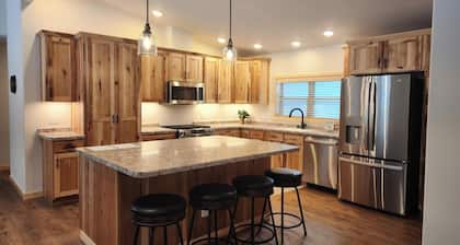 Spacious 5-BR home in Manitowish Waters with pier access on Chain of Lakes.