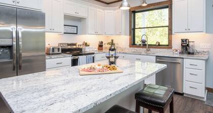 A new vacation retreat nestled along the serene banks of the Kootenai River.