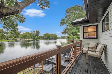 Terrace/patio. Sunset Point: Spacious 4-bedroom house in Elkhart with WiFi, AC, Swim Spa