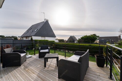 Maison de vacances 'Maison Guidel Plage' avec vue sur la mer, terrasse privée et Wi-Fi