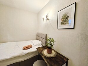 3 bedrooms, iron/ironing board, travel cot, WiFi
