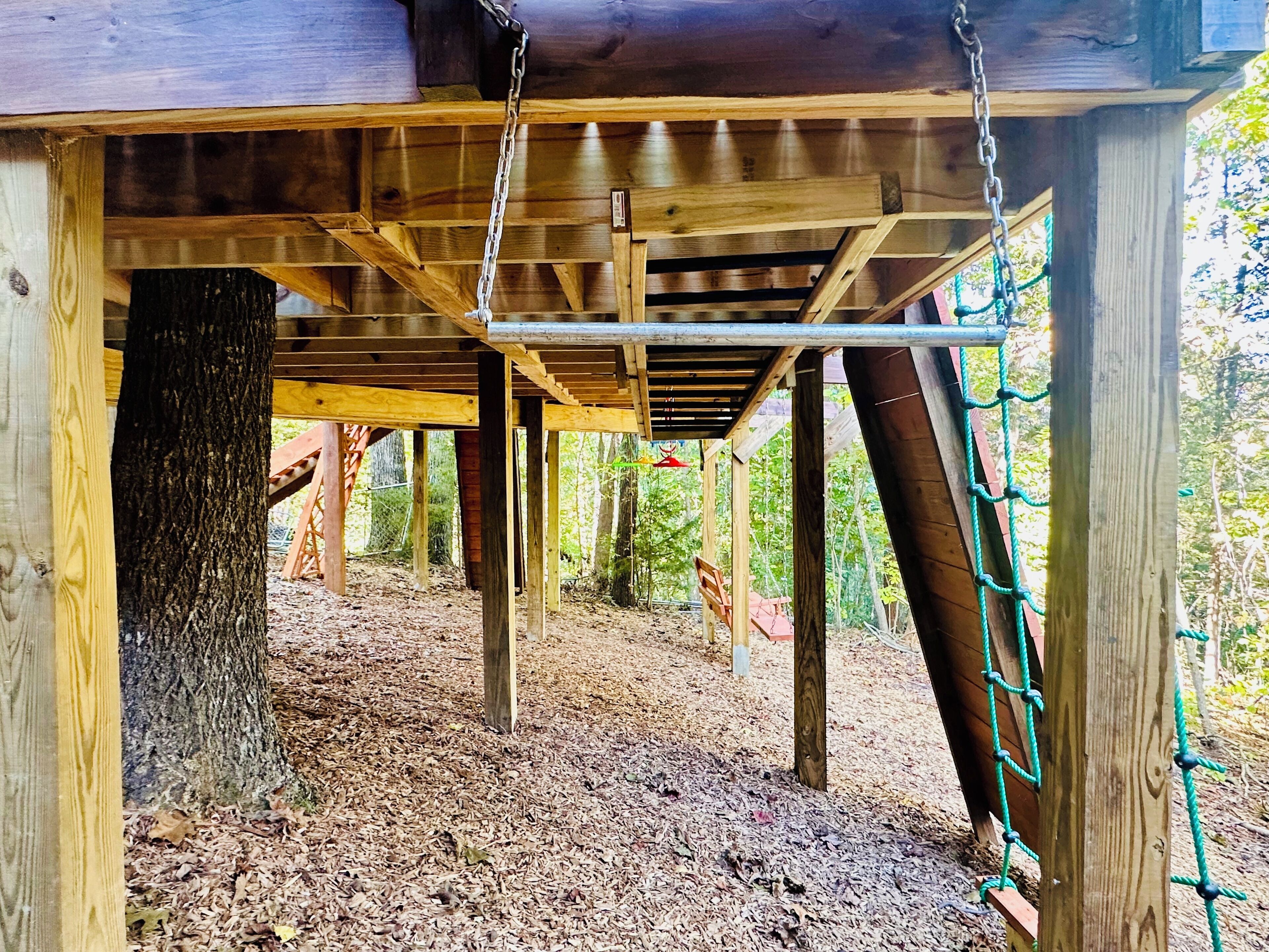 Climbing Bars Under the Treehouse.