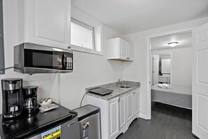 Microwave, coffee/tea maker, cookware/dishes/utensils