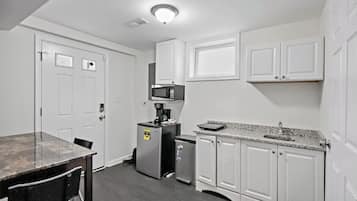 Microwave, coffee/tea maker, cookware/dishes/utensils