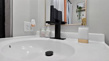 Hair dryer, towels, soap, shampoo