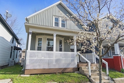 Downtown Apt with Wooden Beams & Brick Accents
