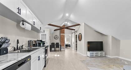 Downtown Apt with Wooden Beams & Brick Accents