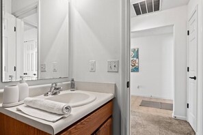 Shower, hair dryer, towels