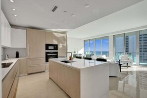 Fridge, microwave, oven, stovetop - Ocean Luxury: 2BR/2.5BA Retreat (Riviera Beach)