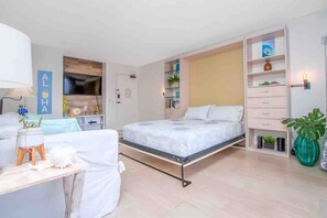 Desk, iron/ironing board, travel crib, WiFi