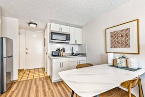 Fridge, microwave, stovetop, coffee/tea maker