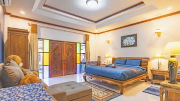 Family Room, 1 King Bed with Sofa bed, Non Smoking, Pool View | Desk, laptop workspace, iron/ironing board, free WiFi