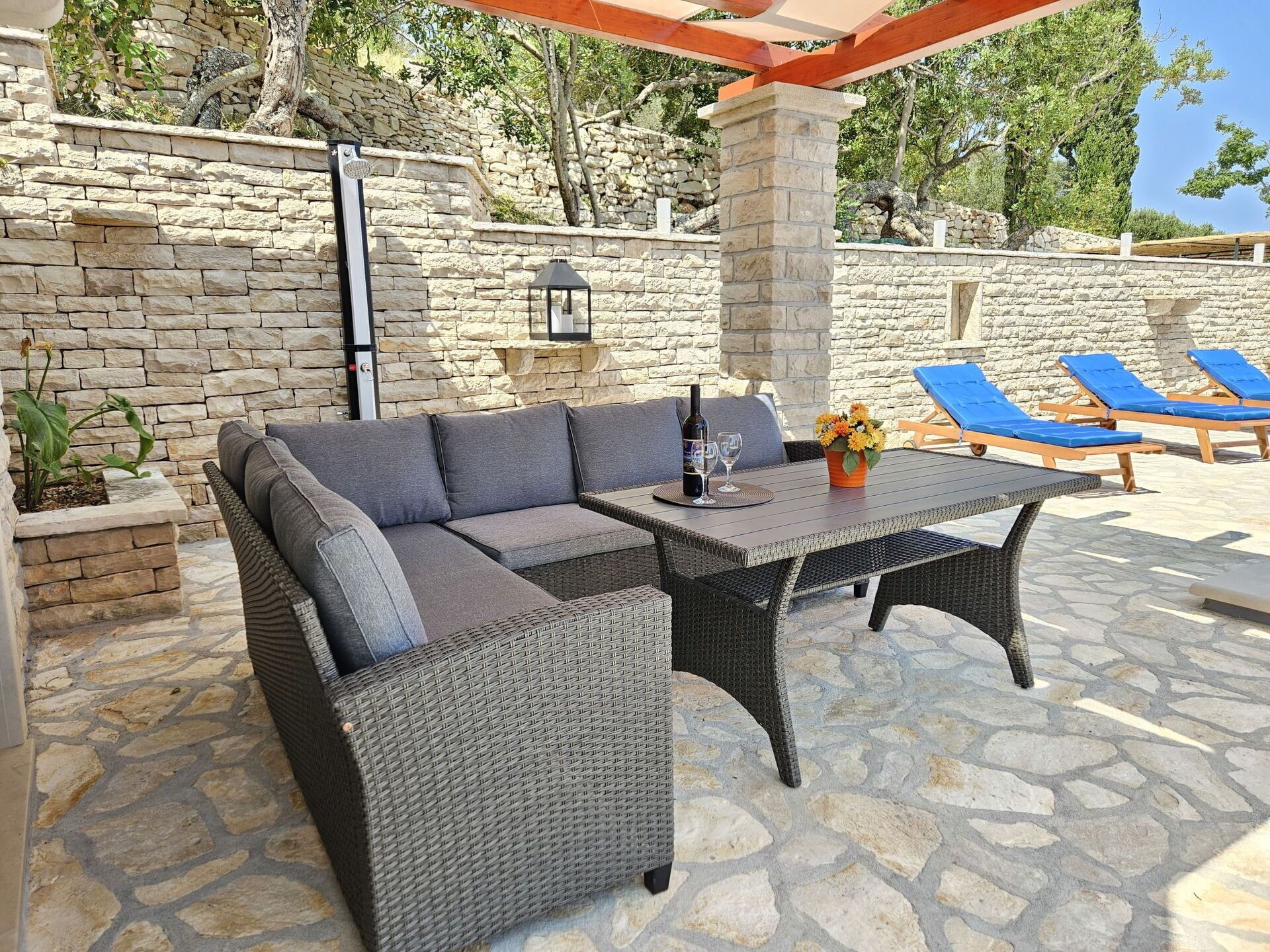 Furniture, Outdoor Furniture, Outdoor Table, Composite Material, Chair, Flagstone, Patio, Shade, Wicker, Outdoor Structure