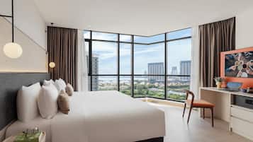 Premium bedding, down duvets, in-room safe, desk