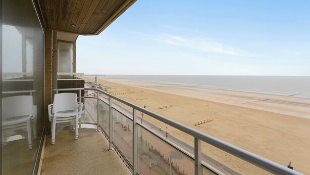 A balcony with a view of a sandy beach and the ocean. - Apartment in Blankenberge near Belgium Pier (BLANKENBERGE)