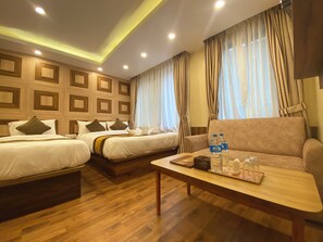 Deluxe Double or Twin Room, City View | 1 bedroom, desk, laptop workspace, soundproofing