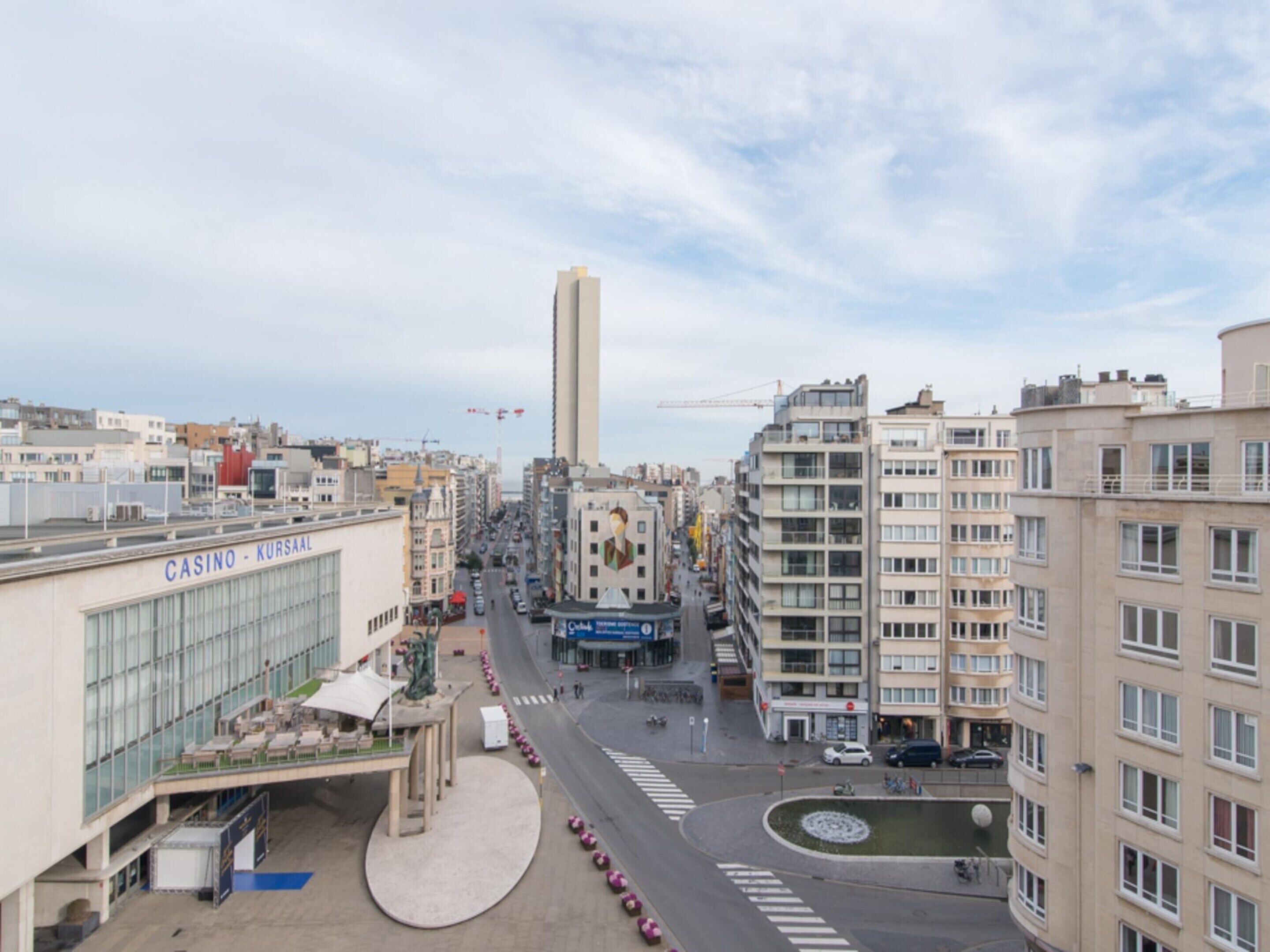 A modern urban street with a casino named 'CASINO - KURSAAL' on the left.