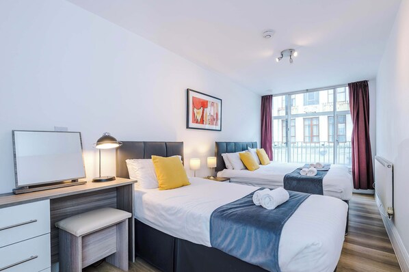 2 bedrooms, desk, iron/ironing board, travel cot