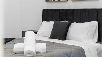 3 habitaciones, tabla de planchar con plancha, wifi y ropa de cama