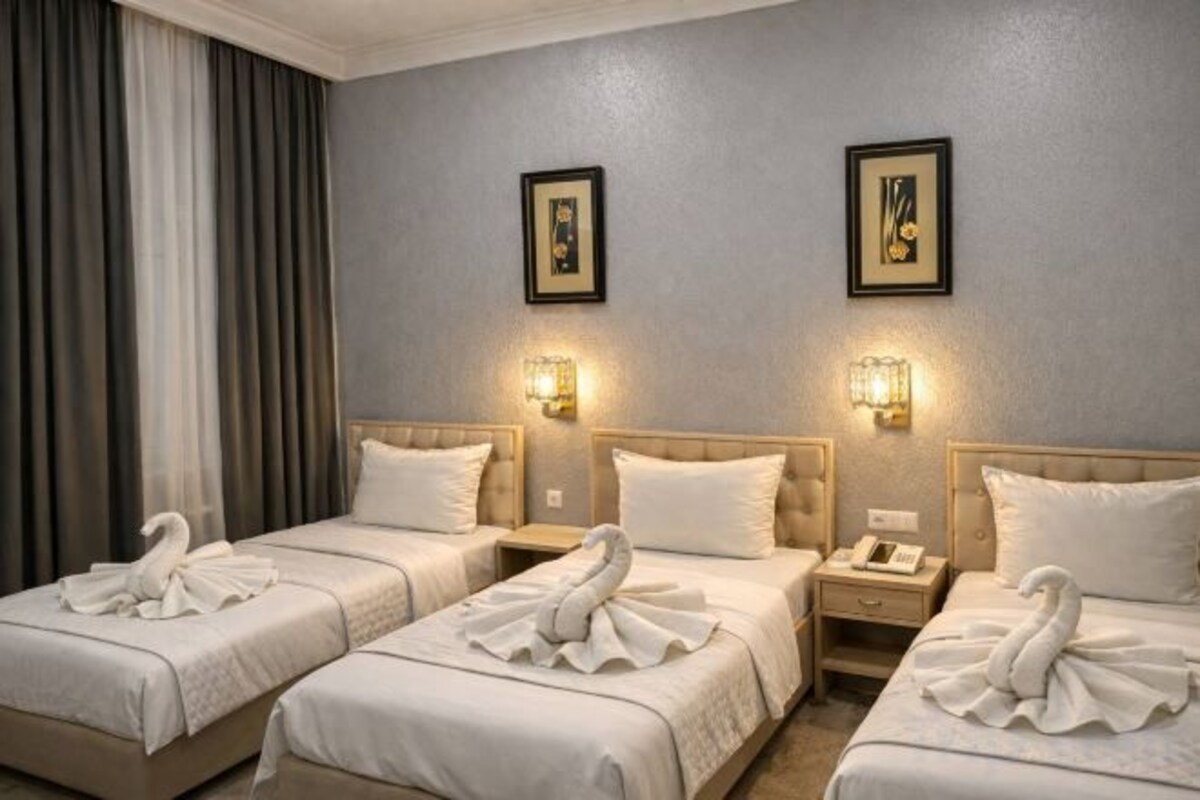 Deluxe Triple Room
