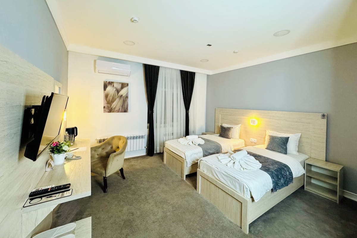Deluxe Twin Room, 1 Bedroom, City View | 1 bedroom, Egyptian cotton sheets, premium bedding, down duvets