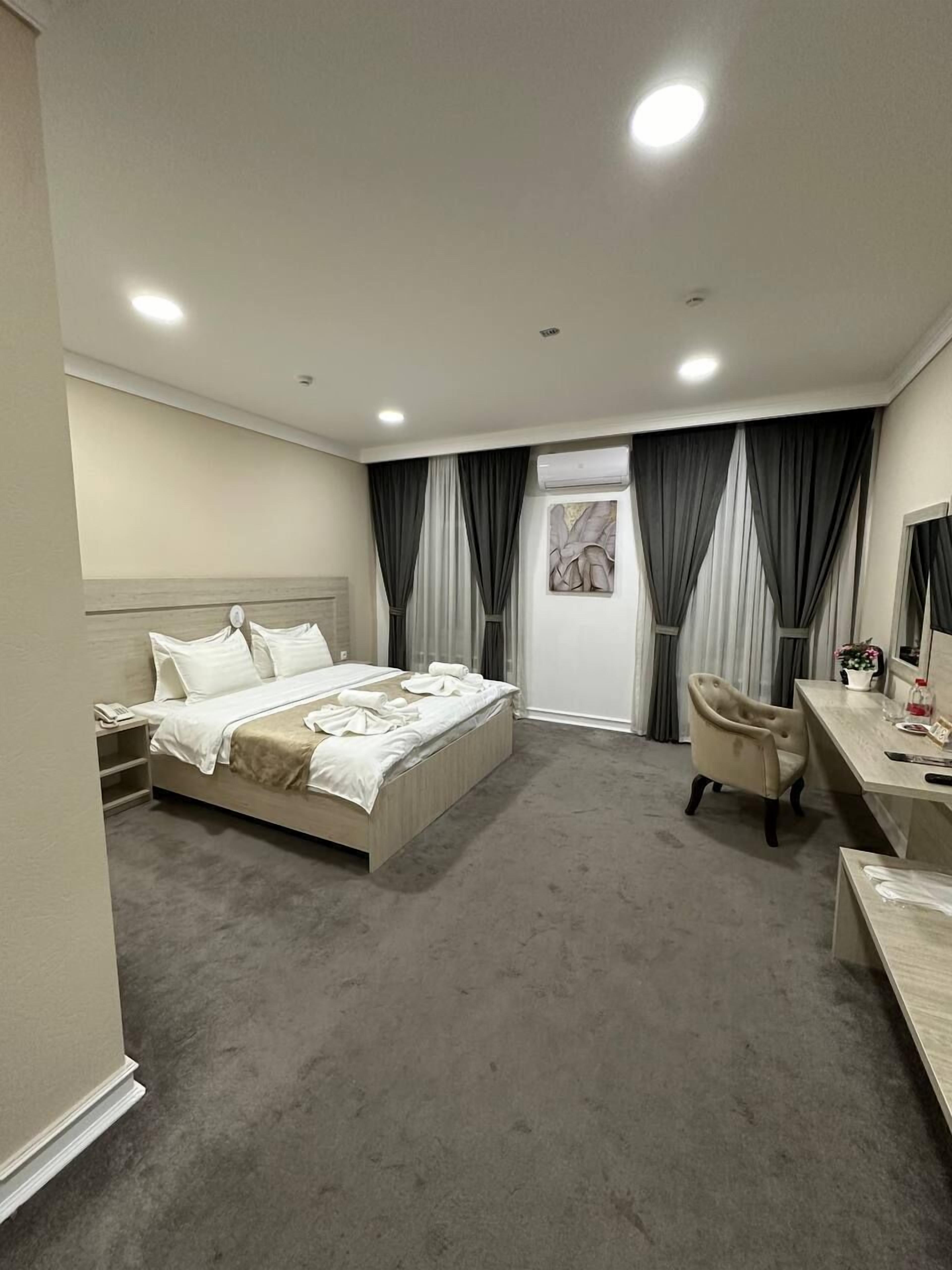 Familiekamer, 1 queensize bed, airconditioning, uitzicht op de stad | Lakens van Egyptisch katoen, luxe beddengoed, donsdekens