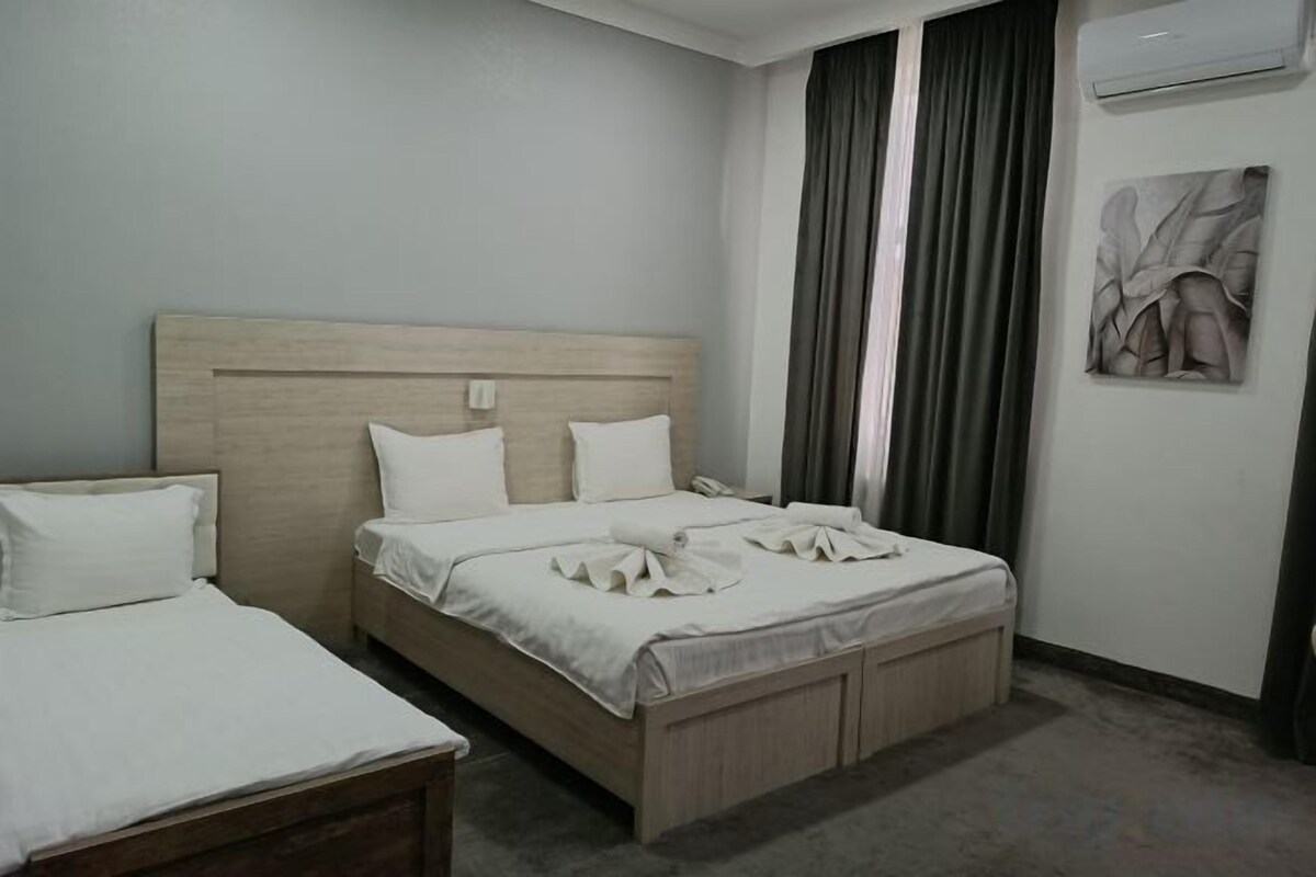 Egyptian cotton sheets, premium bedding, down duvets, laptop workspace