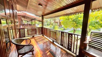 Deluxe Room, Private Bathroom, Garden View | Terrace/patio
