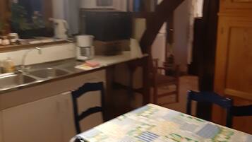 Huis, 2 slaapkamers, uitzicht op tuin | Dineren