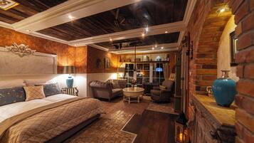 Classic Suite, 1 Queen Bed, Private Bathroom, Ground Floor | In-room safe, blackout drapes, iron/ironing board, free WiFi