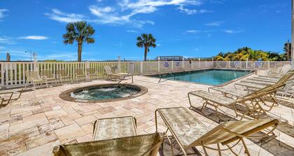 Waves of Fun - steps to beach, pool, spa, game room, bar, bikes, ocean views