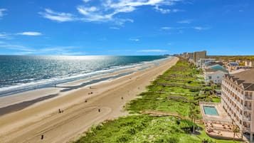 On the beach, sun-loungers, beach towels