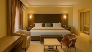 Habitación ejecutiva | 1 dormitorio, ropa de cama de alta calidad, colchones Tempur-Pedic